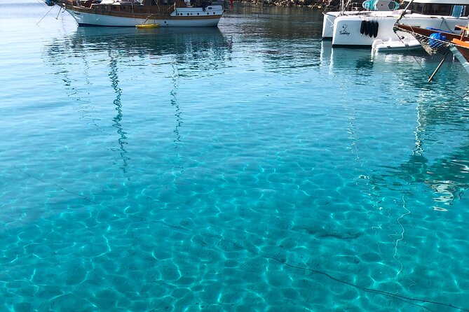 6 Hours Private Charter Boat Tour with Lunch in Bodrum - Rabbit Bay, blue-flag water, and the land-shape story