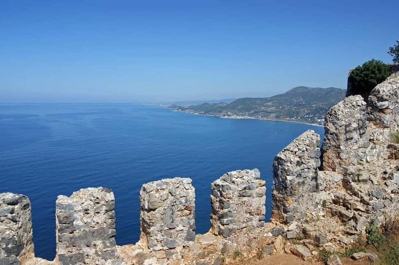 Alanya: Castle Tour with Damlatas Cave & Cable Car Options - Pickup, timing, and the open midibus ride