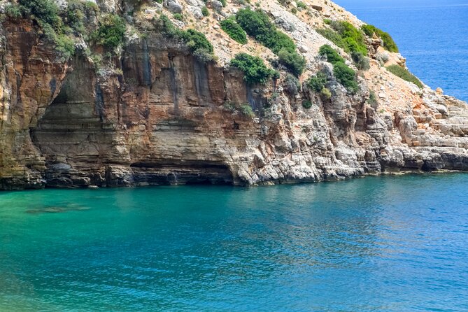 Alanya Catamaran Boat Trip incl. Lunch and drinks - Getting there: Red Tower meeting point and pickup from your hotel