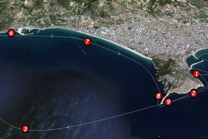 Alanya Catamaran Boat Trip incl. Lunch and drinks - Landmark views: Red Tower, Kleopatra Beach, Alanya Castle, and the shipyard