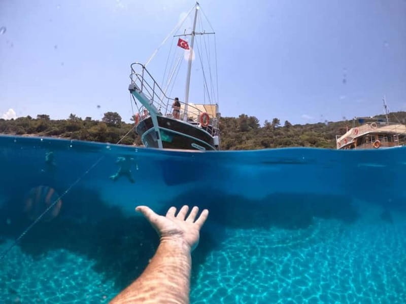 Bodrum: Orak or Black Island Boat Tour with Lunch - Black Island hot spring cave: the warm start that makes the whole day easier