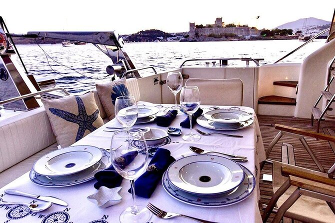 Bodrum Private Motor-Yacht Sunset Tour With Dinner For 3 Hour - Onboard time: snorkel, fish, paddle, repeat