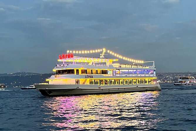 Bosphorus Dinner Cruise with Show and Private Table - The cruise route: Maiden’s Tower, Ortaköy Mosque, and bridge lights
