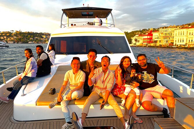 Bosphorus Sunset Yacht Cruise with Snacks and Live Guide - Dolmabahçe Palace from the strait, plus the Rumeli Fortress scale check