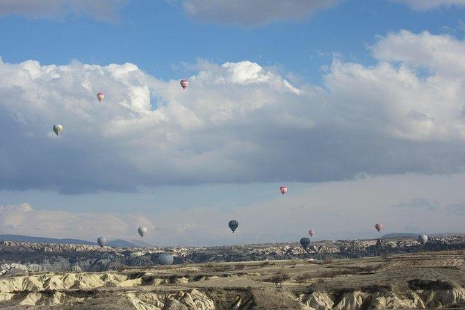 Cappadocia Hot Air Balloon Ride with Breakfast and Champagne - Stop 1: Fairy Chimneys, valleys, and rock formations from above