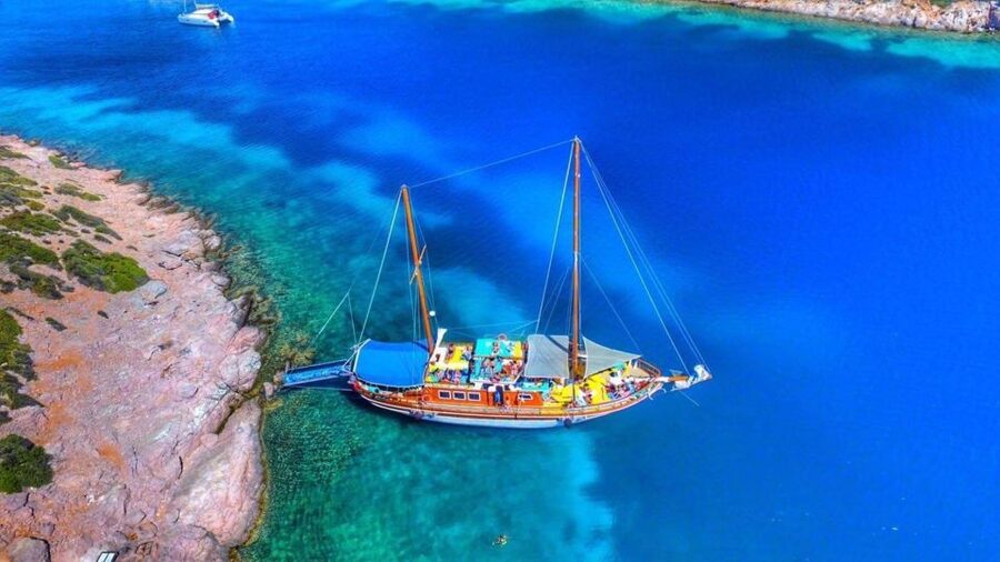 Cesme: Small Group Boat Tour with Open Buffet Lunch - How the day flows: port departure, swim stops, and the return