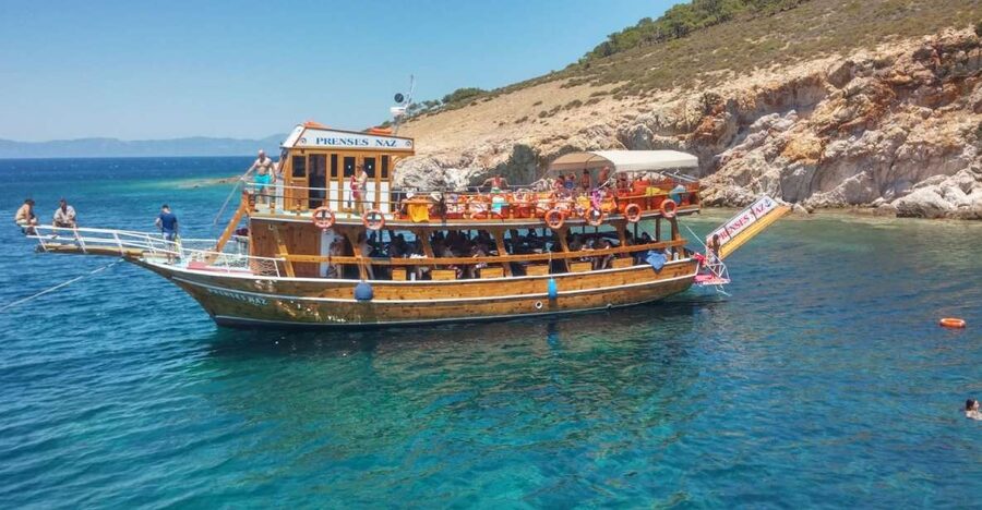Didim/Altinkum: Lazy Day Boat Trip w/BBQ Lunch - The wooden boat experience: deck lounges and indoor shade