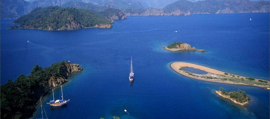 Fethiye: 12 Islands Boat Tour with Lunch and Hotel Pickup - Island time: Tersane, Yassicalar, Flat Island, and the little moments