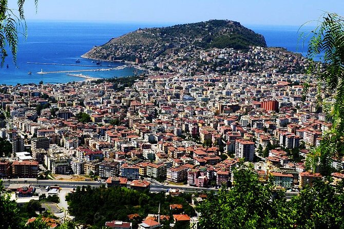 From Alanya: Sightseeing Half Day City Tour w/Cable Car - Transport style and the role of the guide