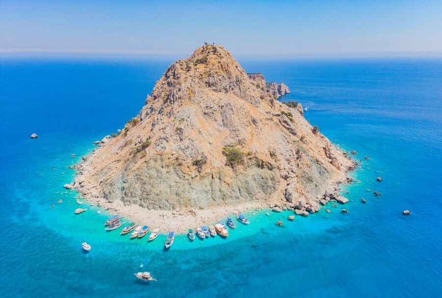 From Antalya: Suluada Island Boat Trip with Lunch - Stop 1 on Suluada: swim time, clear water, and the pebble truth