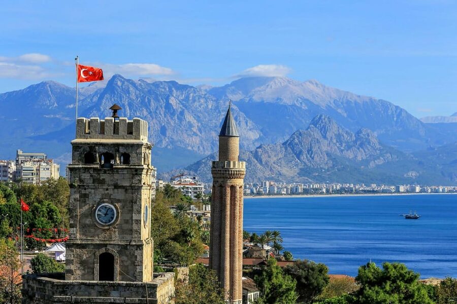 From city of Side: Antalya Old City and Waterfall Day Trip - Guide Style in English and German, Plus Group Size Reality