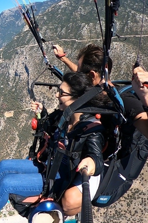 From Fethiye: Oludeniz Paragliding Trip with Transfer - The value in the full package: transfer, park entry, and flight insurance