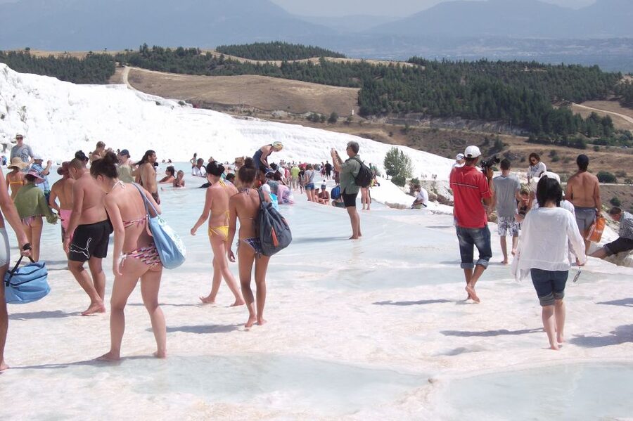 From Kusadasi and Selcuk: Pamukkale and Hiearapolis Tour - Hierapolis first: Necropolis, baths, and the gates you can picture