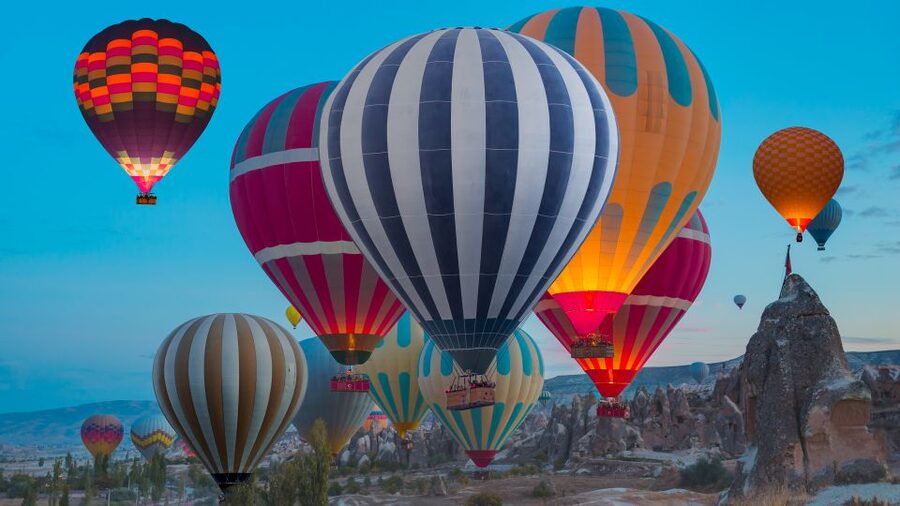 Goreme: Budget Hot Air Balloon Ride over Cappadocia - What You’ll See Below: Göreme Valley, Rock-Cut Churches, and Cave Homes