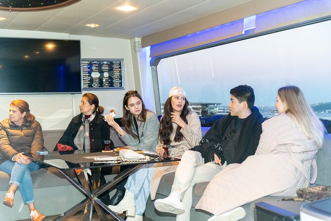 Guided Bosphorus Afternoon Cruise on Yacht - Ortaköy to Bebek: neighborhood color, Bosphorus Bridge feet, and the photo corridor