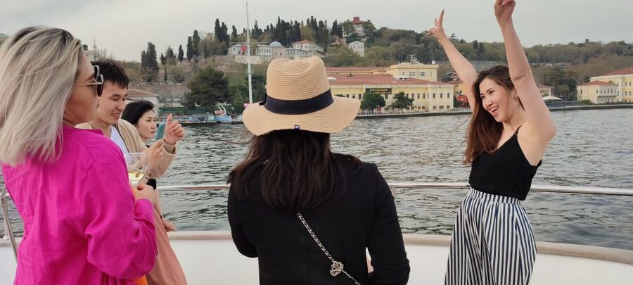 Istanbul: Bosphorus Sunset Cruise on Yacht with Live Guide - Food and drinks on board: canapés, fruit, lemonade, and tea that keep the mood right