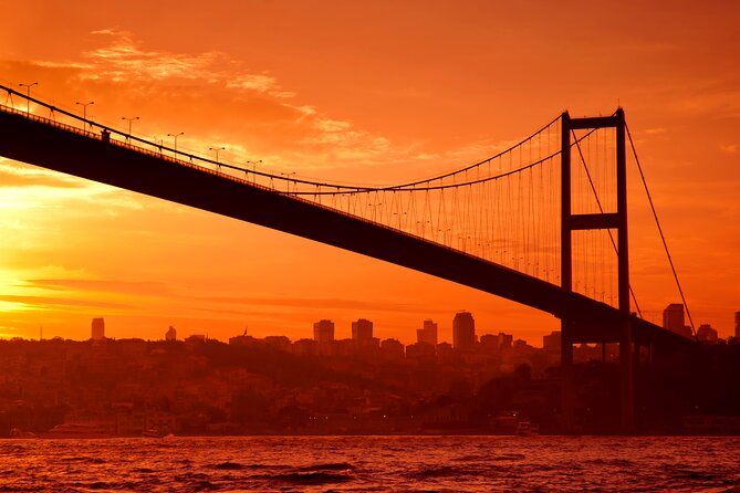 Istanbul Bosphorus Sunset Yacht Cruise with Snack and Refreshment - Dolmabahçe Palace from the water: big, elegant, and close enough