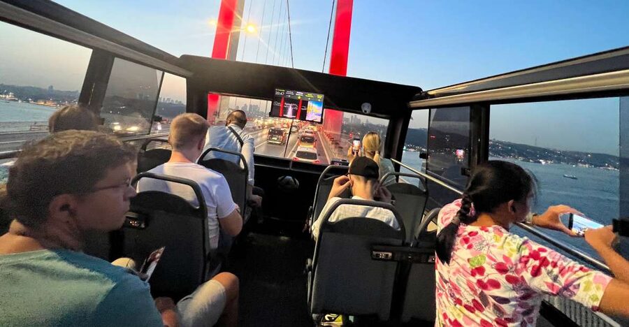 Istanbul: Two Continents Evening Bus Tour with Commentary - Sultanahmet District: Hagia Sophia, Blue Mosque, and Topkapi Palace from the road