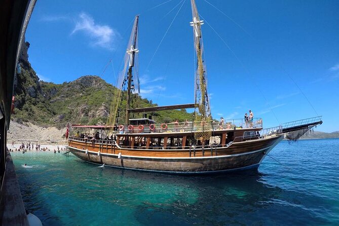 Kusadasi Boat Trip With Lunch And Hotel Transfer - The boat day rhythm: three bays, multiple swims, real sun time