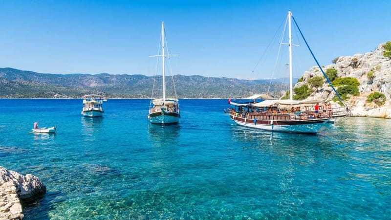 Marmaris: Boat Trip w/Lunch, ansfer & Unlimited Drinks - Getting picked up and sailing from the Atatürk Statue port