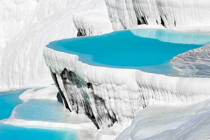 Pamukkale Small Group Guided Tour from Antalya incl. Lunch - Hierapolis and the Roman Amphitheater: Attalid ruins you can actually picture