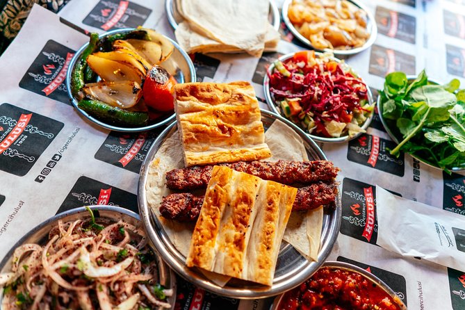 PRIVATE Istanbul Food Tour - 10 Tastings including Raki & Padi - Stop 1 in Kadıköy Çarşısı: Pide, Turkish delight, and the snack lineup