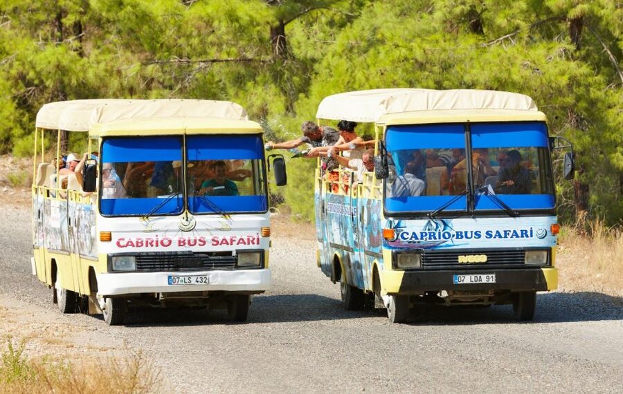 Side: Green Canyon Boat Trip & Bus Safari with Lunch - Traditional village moments and a mosque visit that adds context