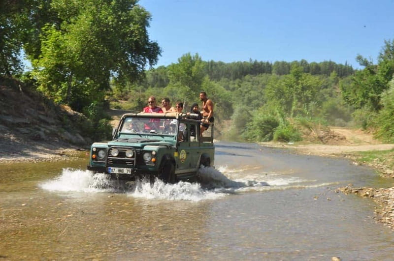 Side: Jeep Safari Adventure with Lunch at Green Lake - Off-road jeep time: fun energy, but hold on tight