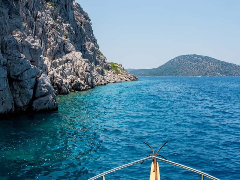 Side: Pirate Boat Trip with Lunch & Swimming Stops - Coastline Views Toward Side or Eastward: Dolphins and Sea Turtles