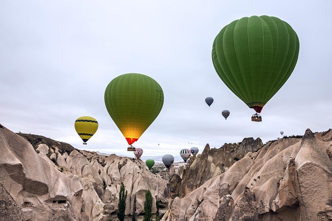 Sunrise Hot Air Balloon Flight Over Göreme & Fairy Chimneys - Göreme on the ground: breakfast, balloon staging, and the waiting game